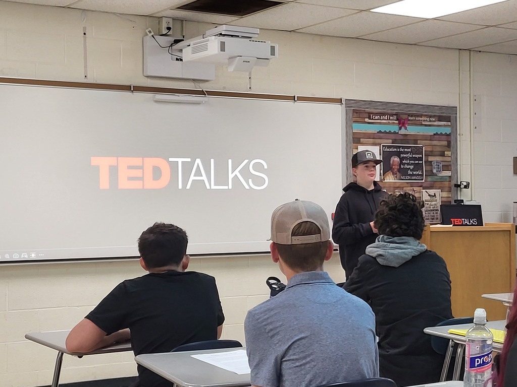 8th grade student giving a presentation