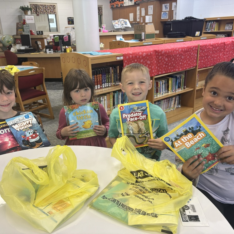 students with their books 