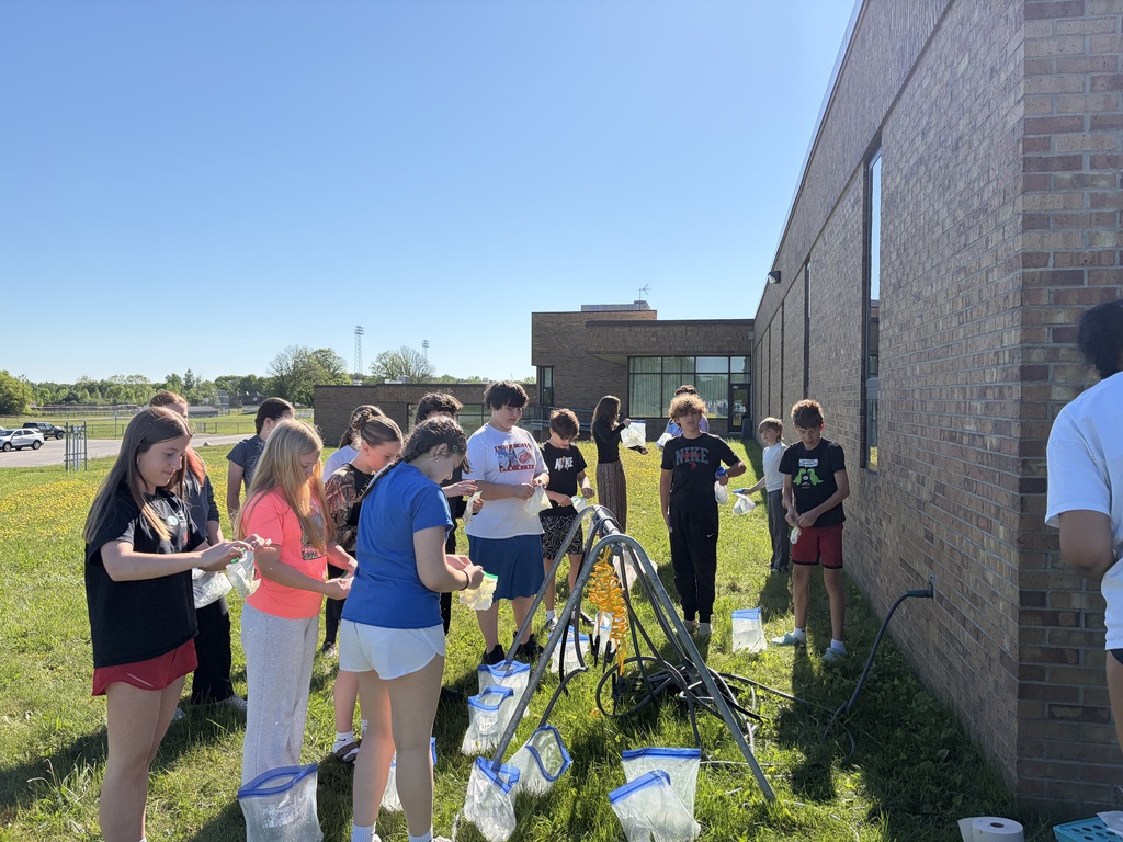 photo of junior high students making ice cream in a bag
