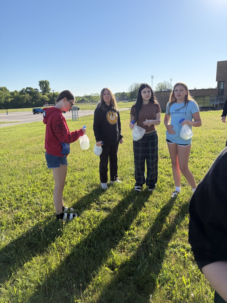 photo of junior high students making ice cream in a bag