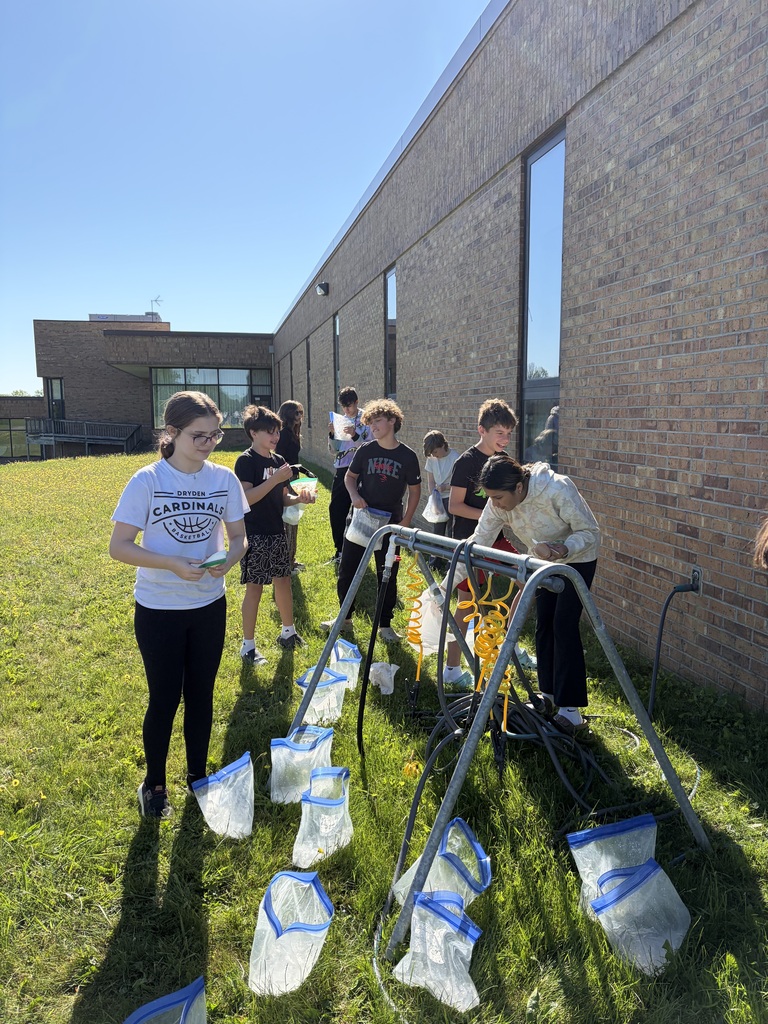 photo of junior high students making ice cream in a bag