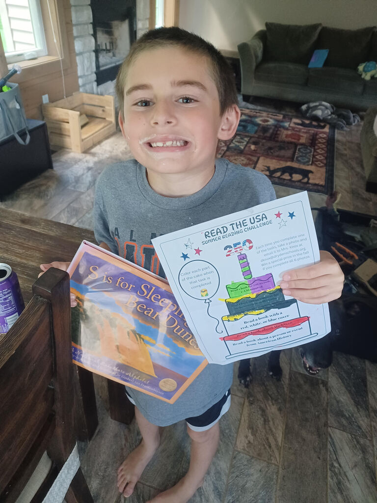 Two more books read in the "Read the USA" Summer Reading Challenge for Joey - a book about Michigan and a book with a state's name in the title.  #growingreaders #proudcardinal