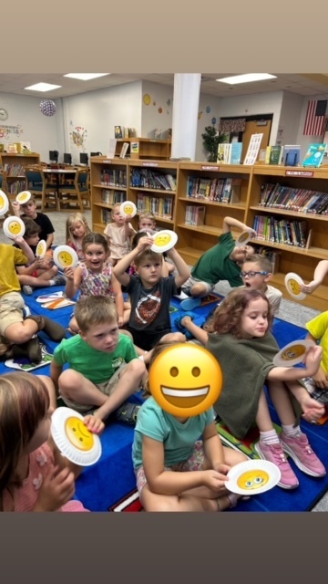 Good book care or bad book care?  The Kindergarteners analyzed photos and used their emoji cards to show their knowledge. #growingreaders #proudcardinal