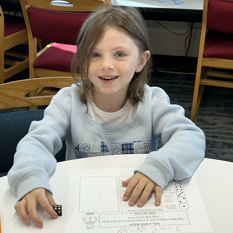 2nd grade played “Roll a Dice Buddy” to review library book care rules. #proudcardinal