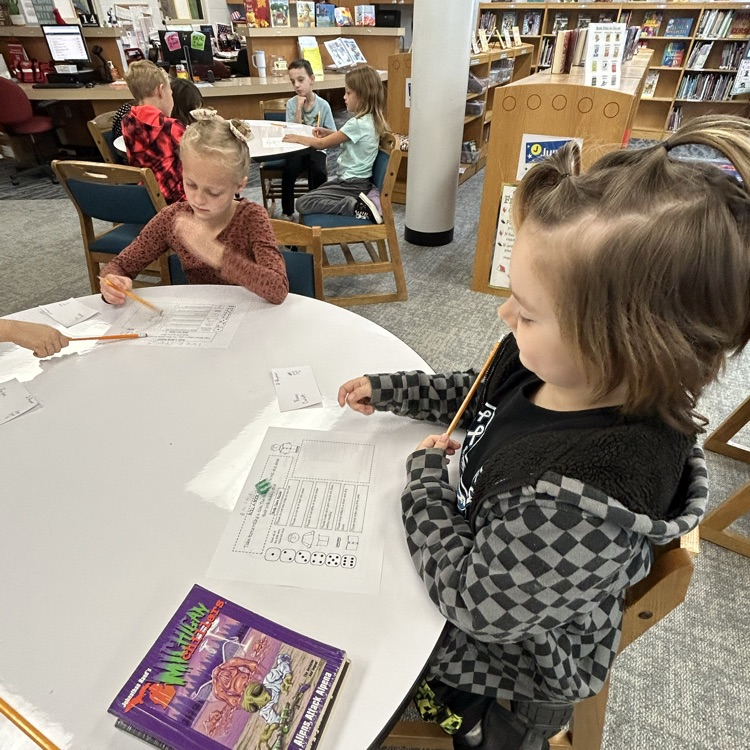 2nd grade played “Roll a Dice Buddy” to review library book care rules. #proudcardinal