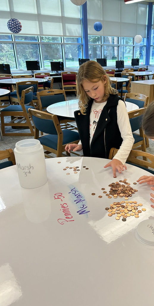 Coin war - students counting coins