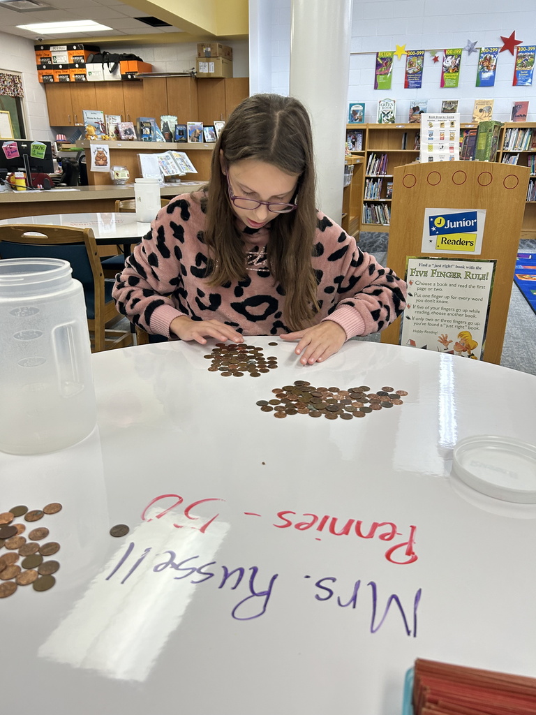 Coin war - students counting coins
