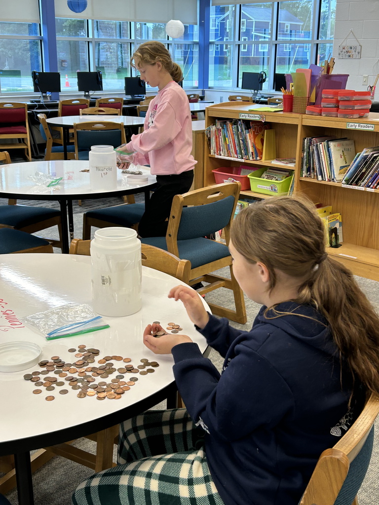 Coin war - students counting coins