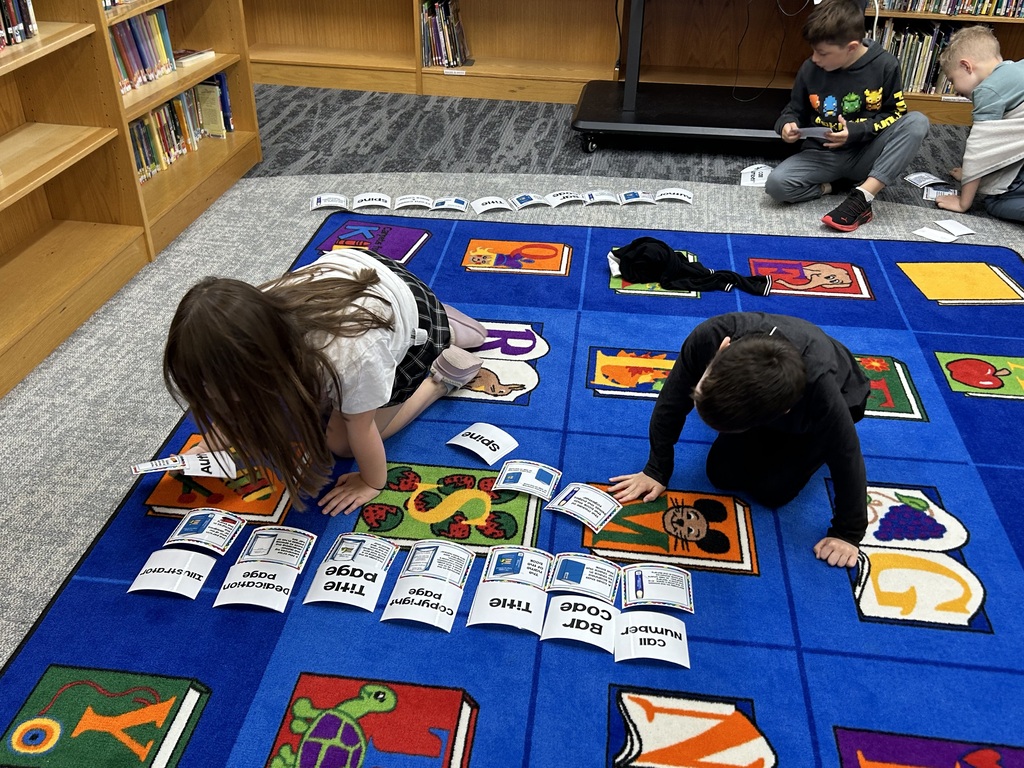 2nd graders reviewed parts of a book in Library Special using a matching activity. #growingreaders #proudcardinal