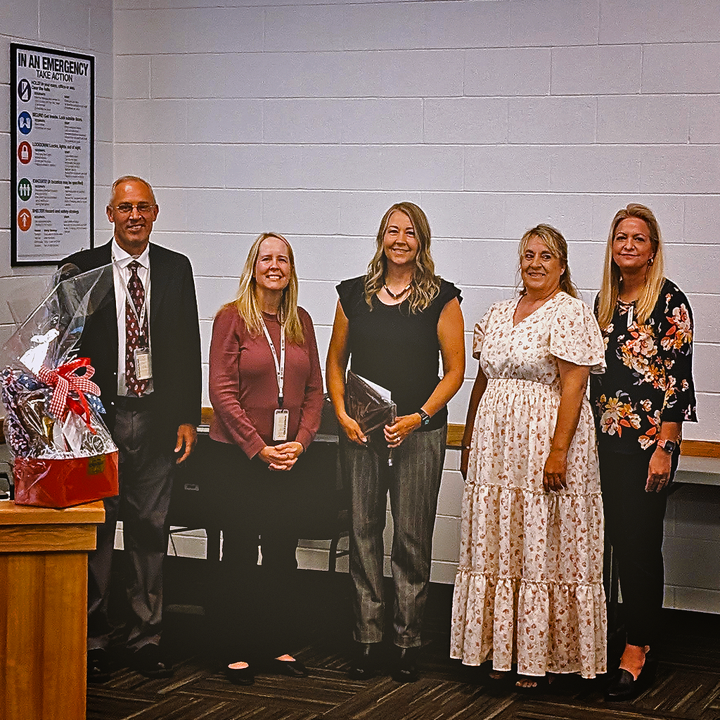 Pictured is of Lisa Drake, the teacher of the year. Also, in the picture is Jason Young, Kendra Embleton, &  Nichol Alldredge.