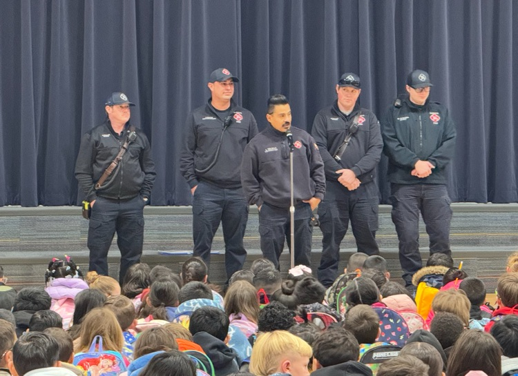 Dumas fire department speaking at school 