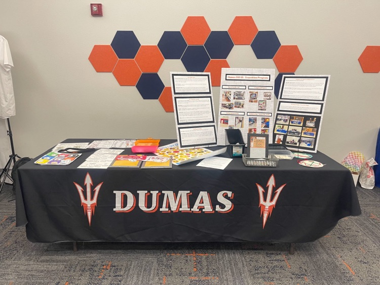 presentation table with information and balloons 