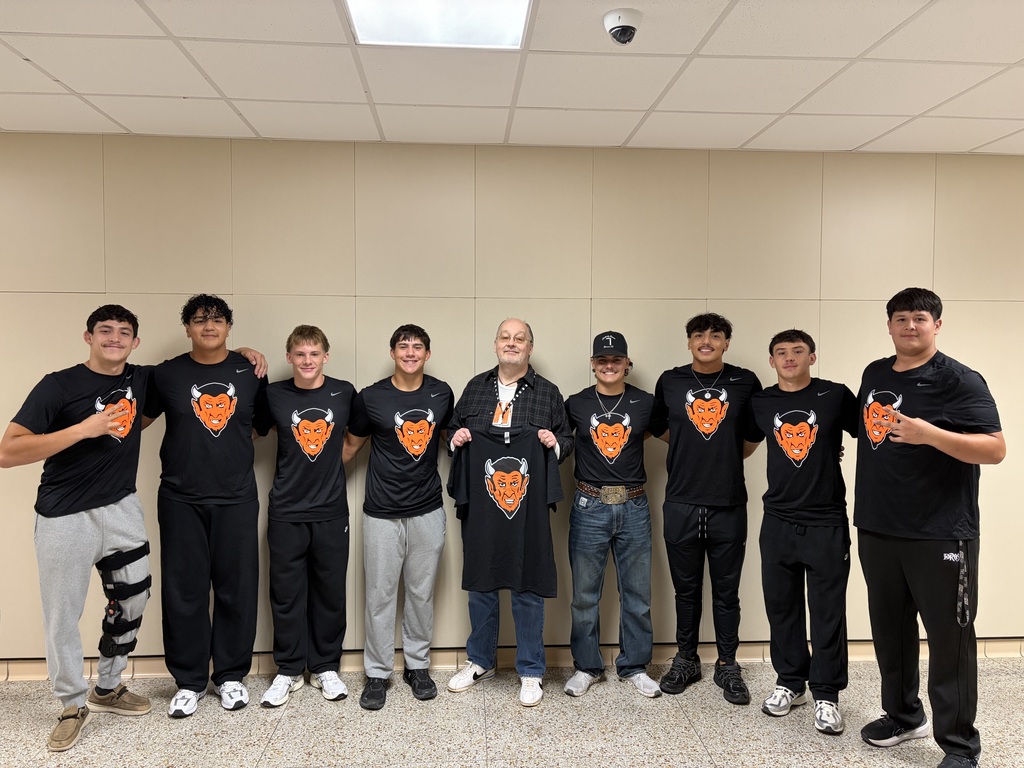 dumas football players with mr. lemmons