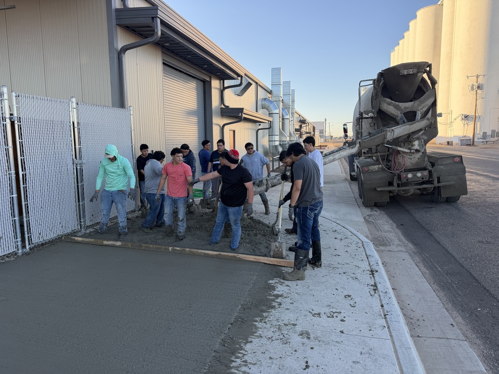 contruction class pouring concrete