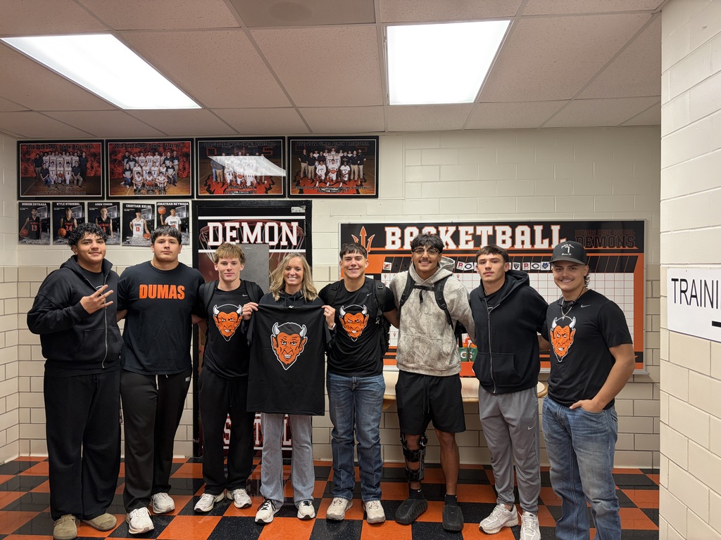 coach robinson with football captains