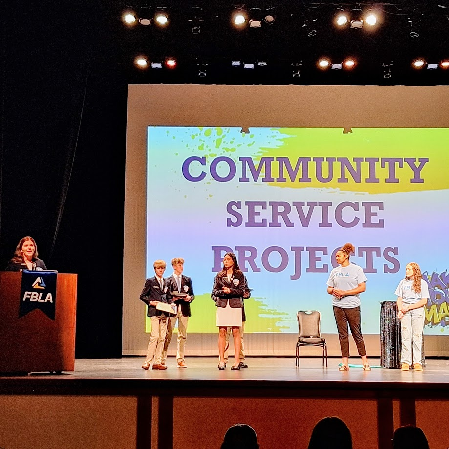 President Kendri Broughton received two community service awards for Dumas. 