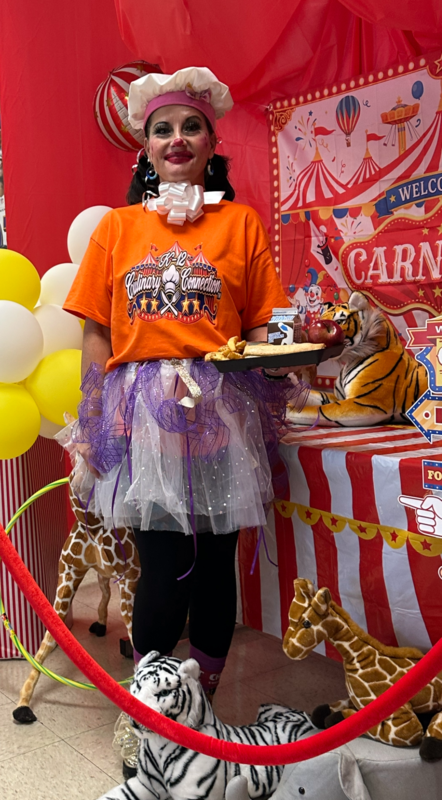 Cafeteria lady dressed up in circus attire