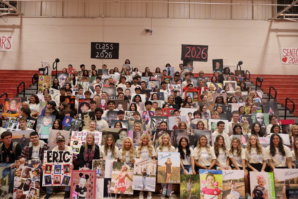 senior group with posters 