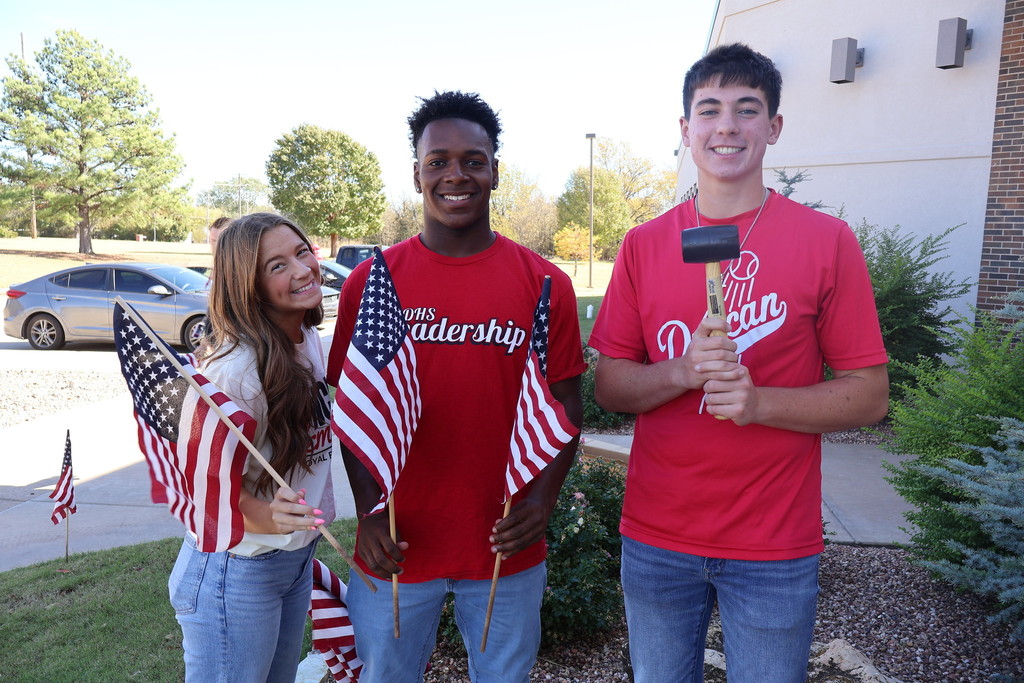 Student holding Flags