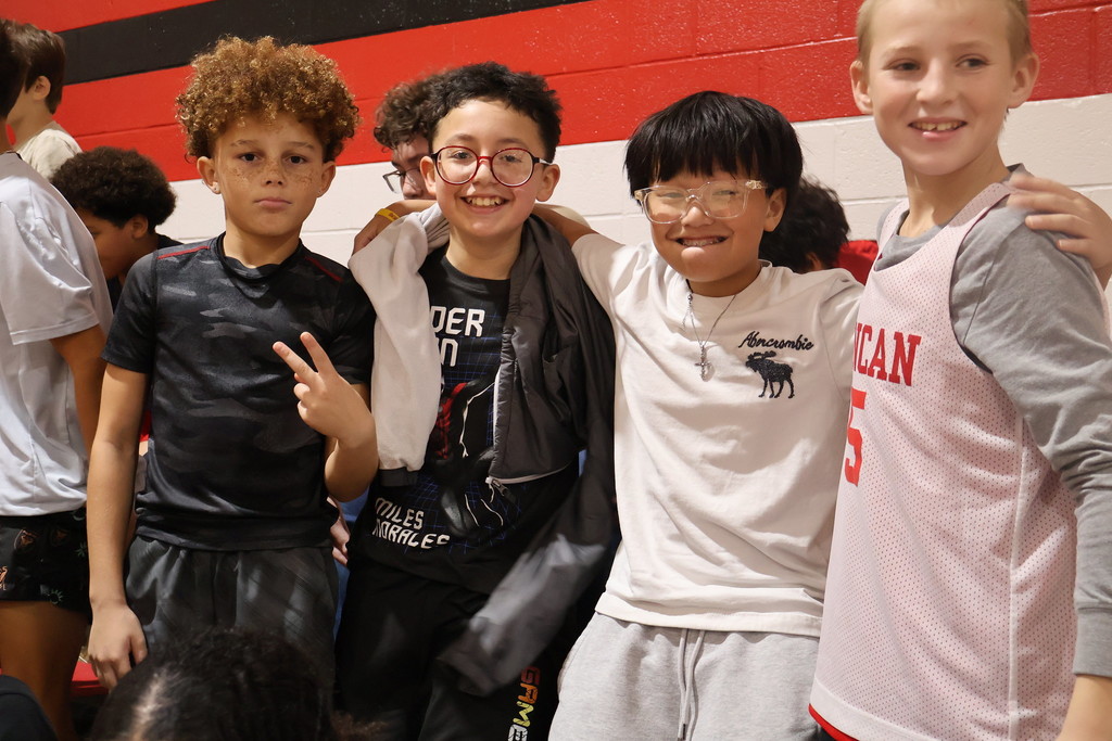 Middle school students smiling 