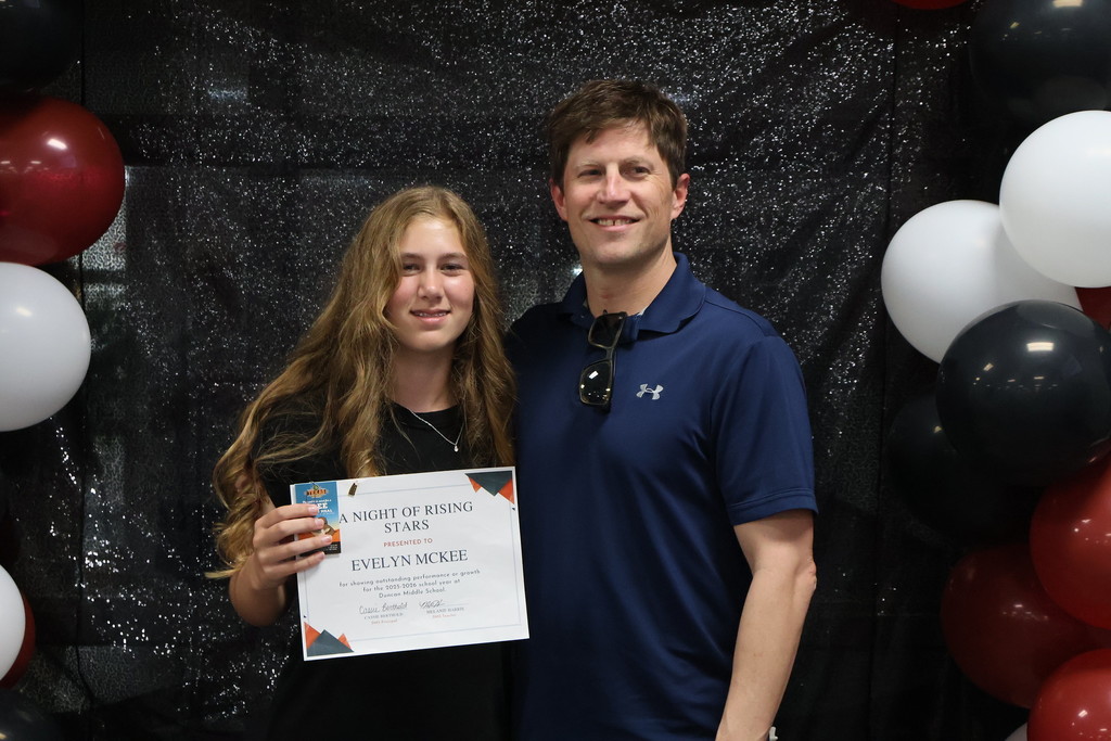 parent and student smiling 