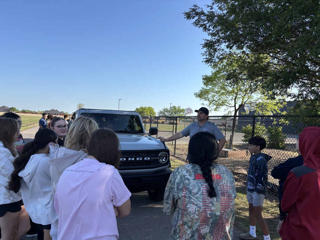 student learning about a vehicle