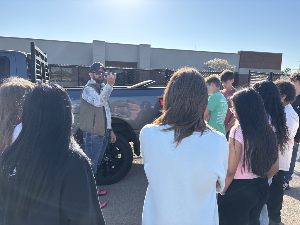 student learning about a vehicle