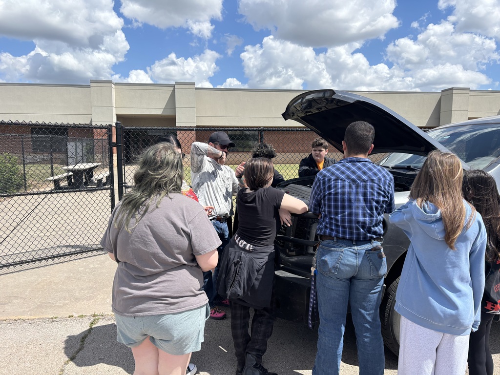 student learning about a vehicle