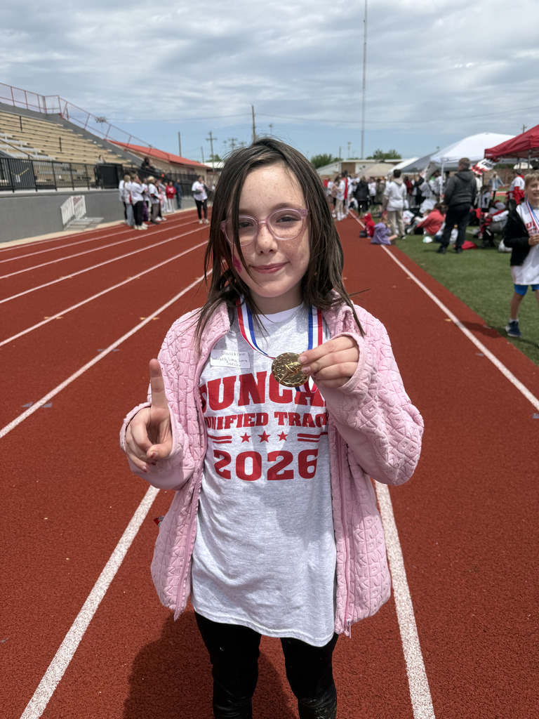 student with medal 