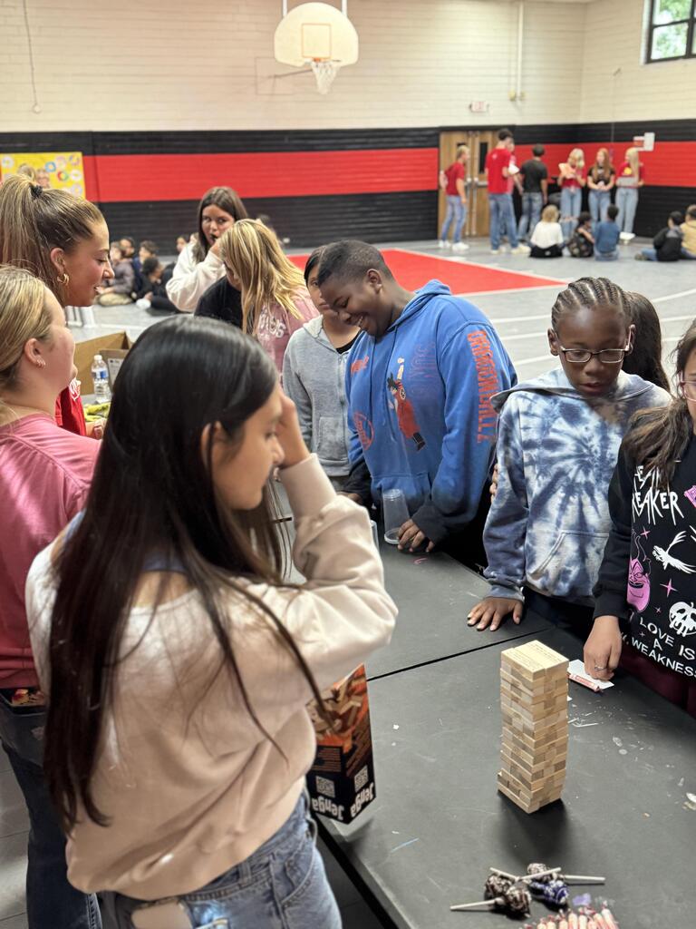 Students participating in industry tours at their stations