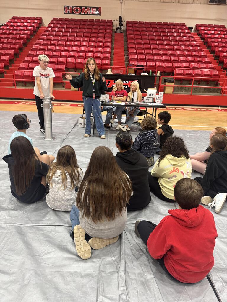 Students participating in industry tours at their stations