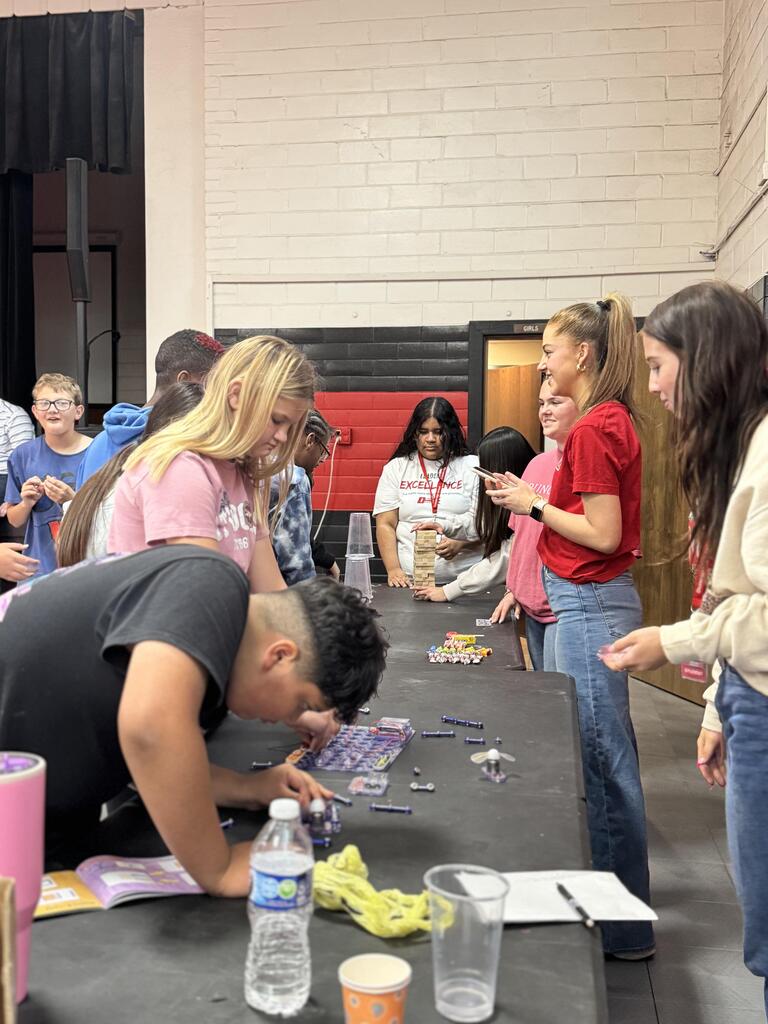 Students participating in industry tours at their stations