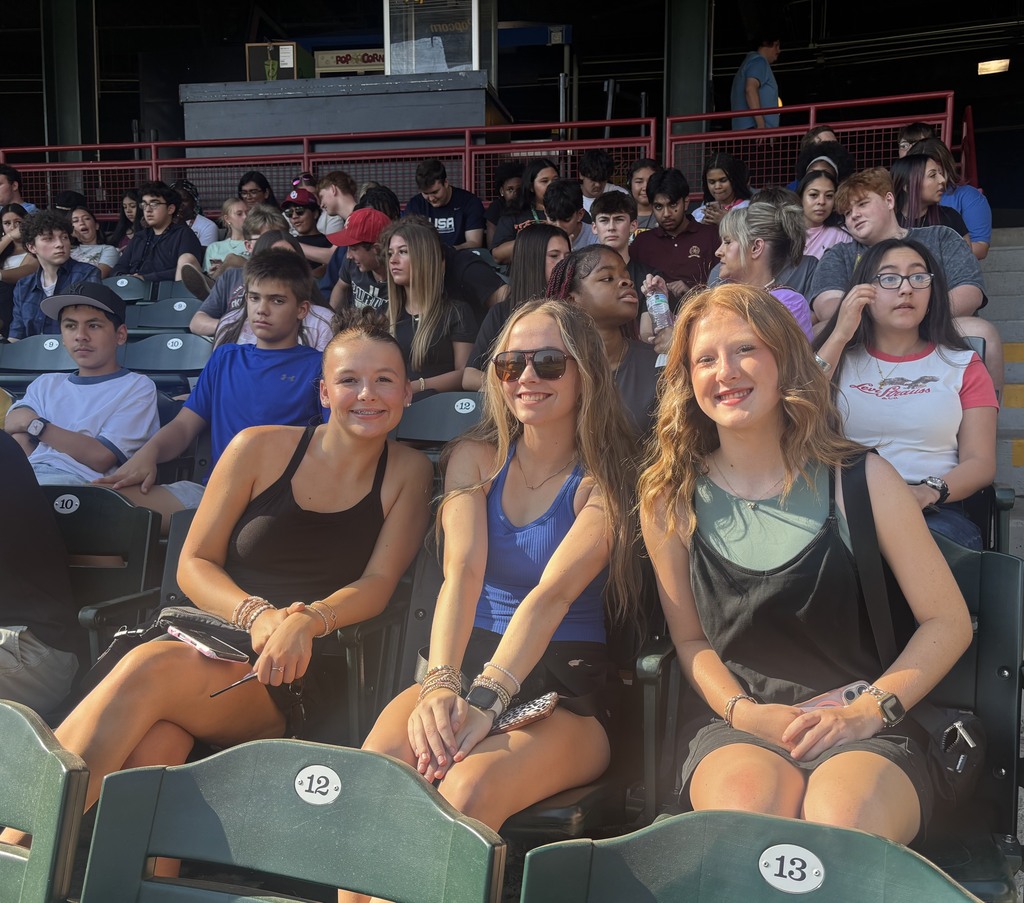 students smiling on game day