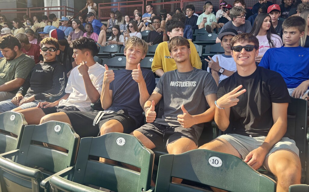 students smiling on game day