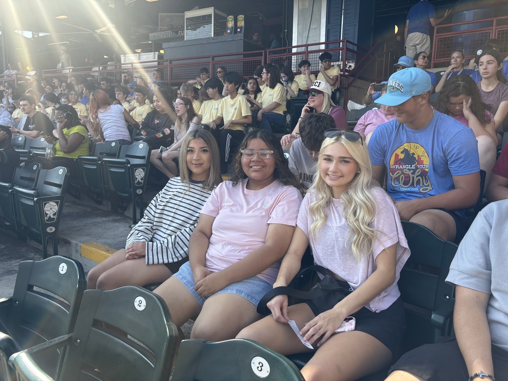 students smiling on game day