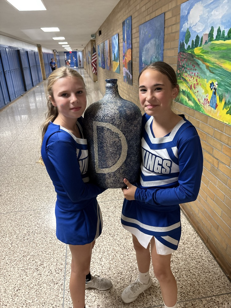 7th grade students holding the spirit jug!