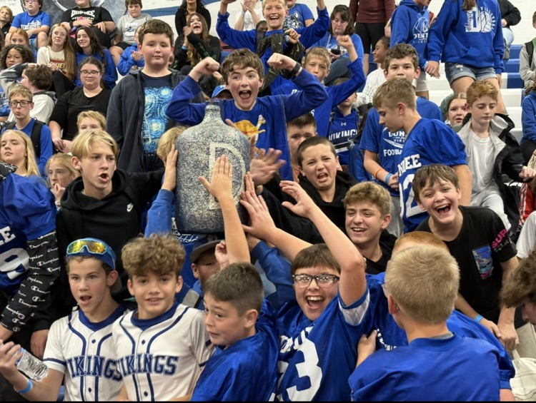 7th grade students holding the spirit jug!