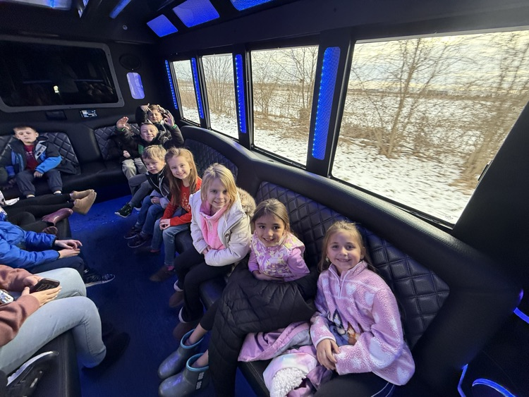 students on limo ride