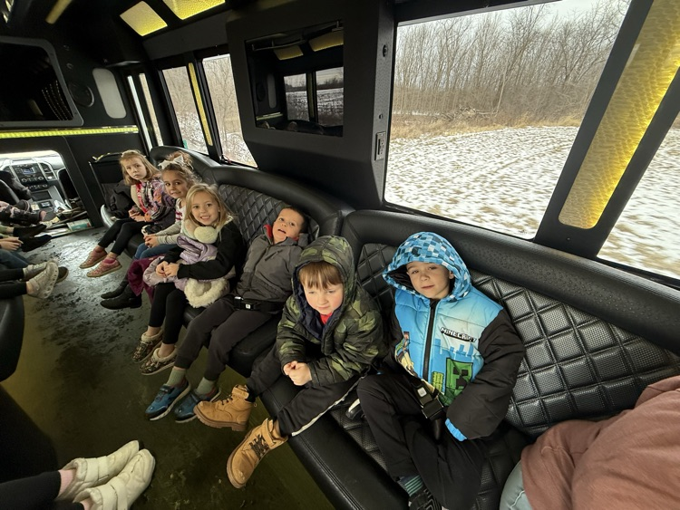 students on limo ride