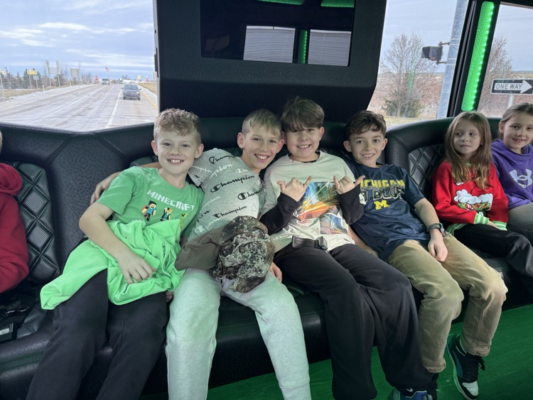 students on limo ride