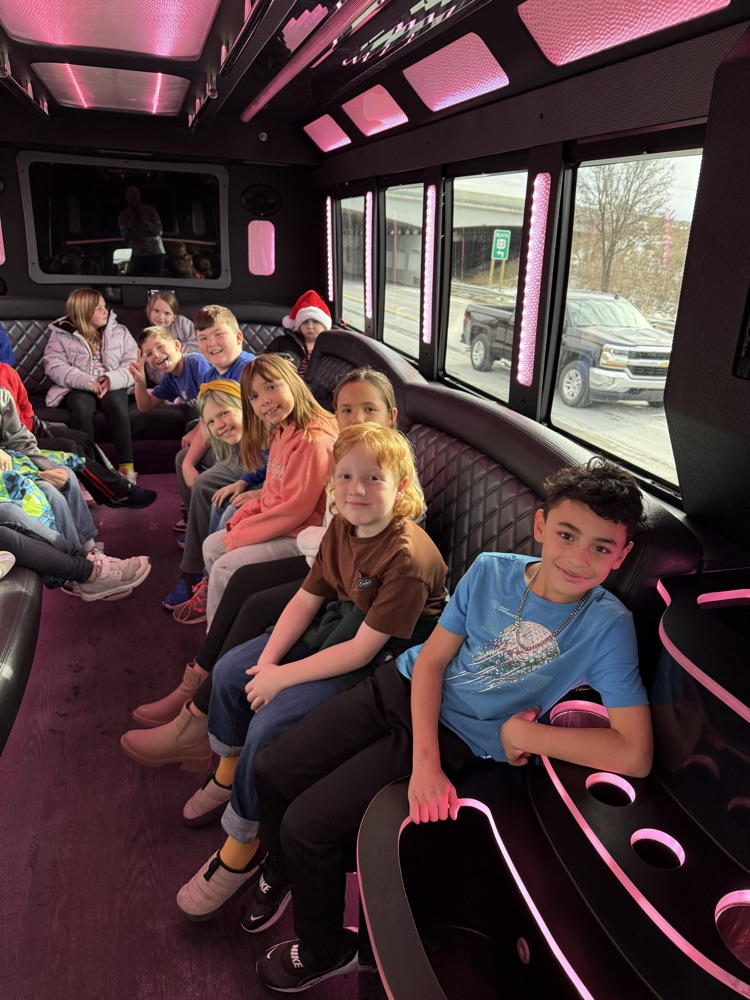 students on limo ride