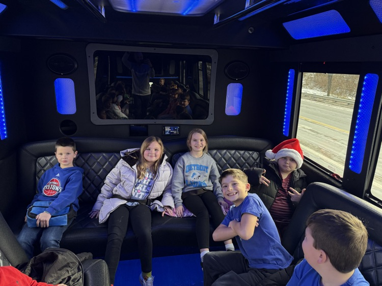 students on limo ride