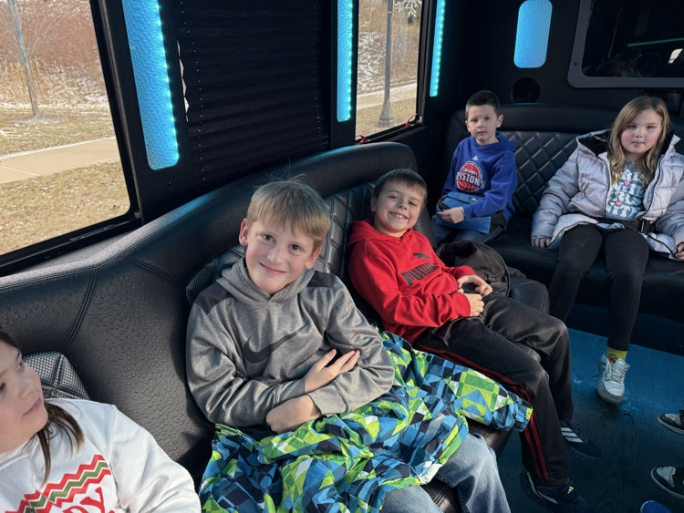 students on limo ride