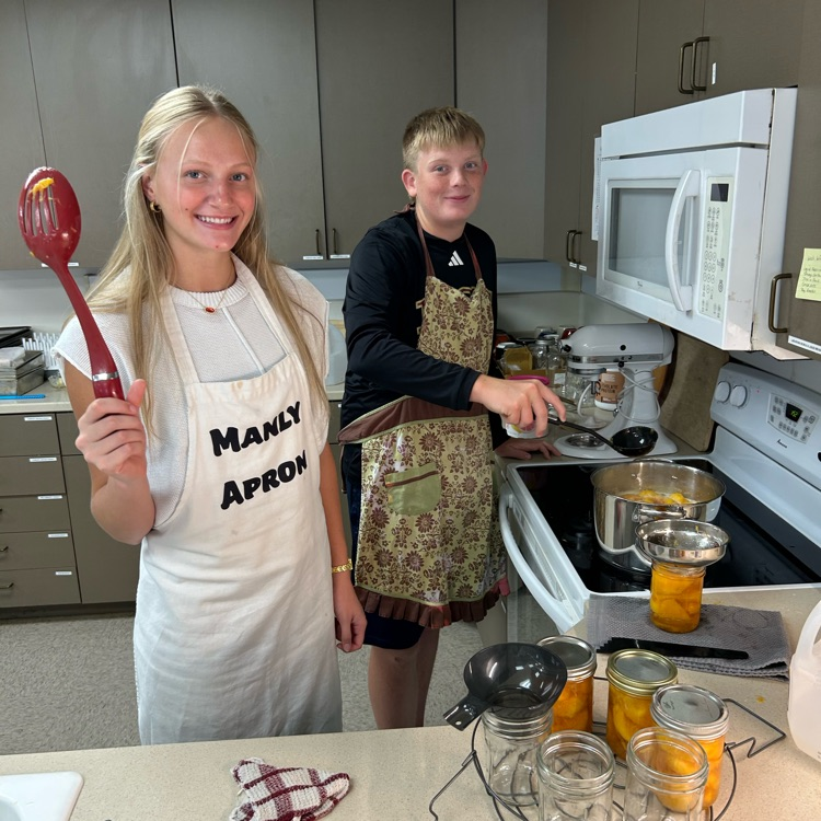 Abi and Jack manning the stove