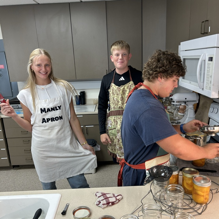 Brock, Jack and Abi canning peaches
