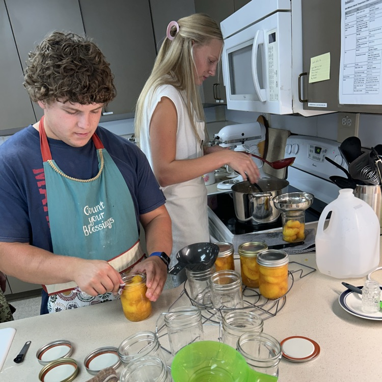Brock and Abi canning.