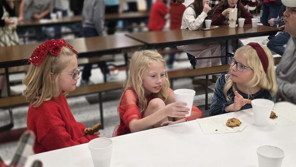 Elem Girls enjoying cookies and hot chocolate