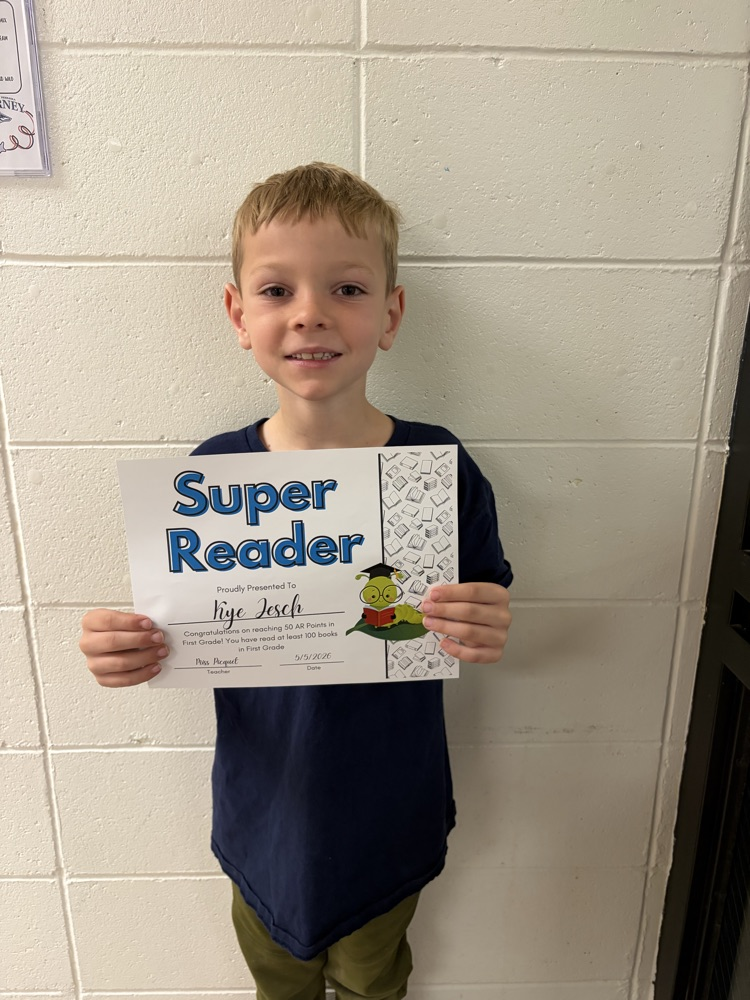 Kye holding reading award