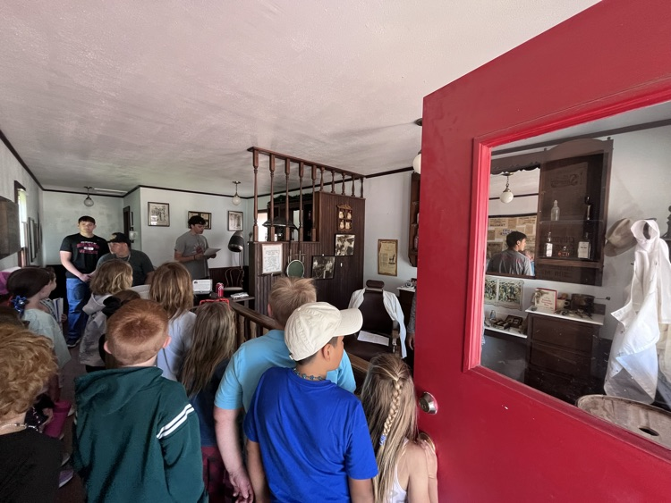 students visiting the barber shop