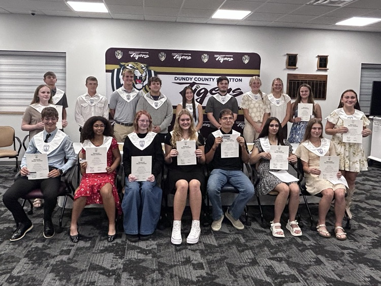 Current and newly inducted members pose for a chapter picture